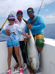 family with fish caught in Mexico