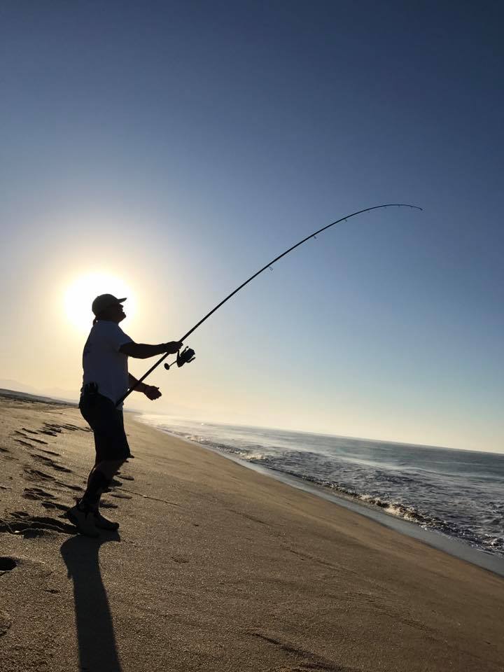 fishing at sunset